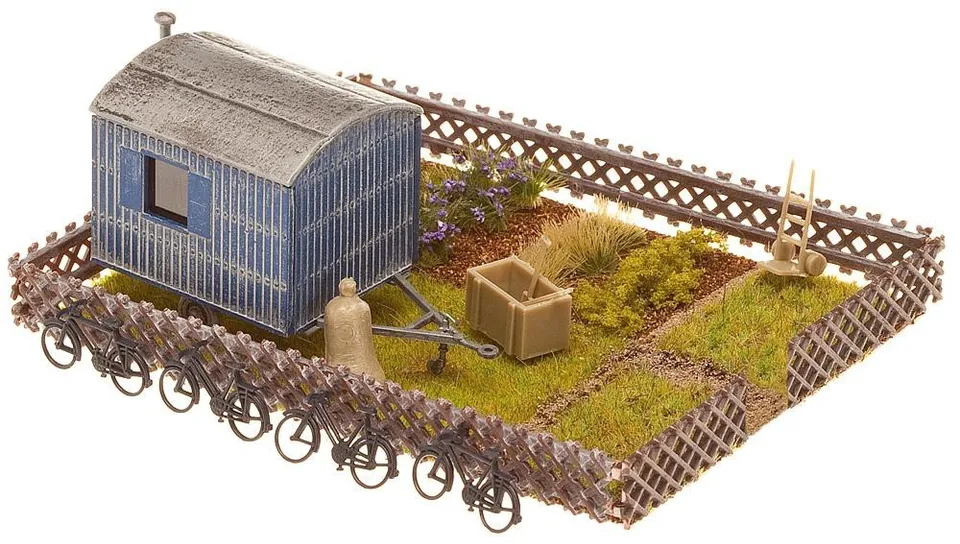 faller-180490-schrebergarten-mit-bauwagen-h0-bausatz image 1
