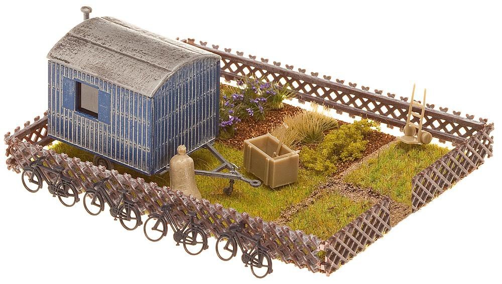 faller-180490-schrebergarten-mit-bauwagen-h0-bausatz image 1